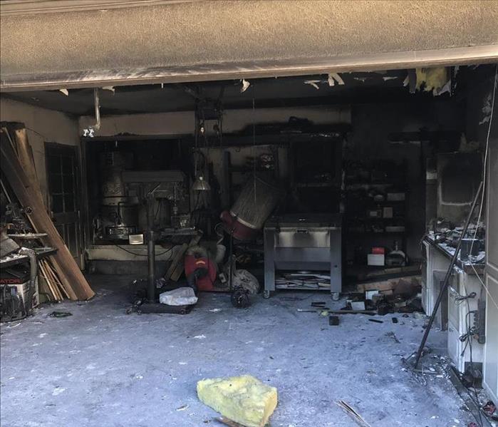 Garage full of storage items that have major smoke damage